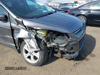 2013 Ford Escape SE with VIN 1FMCU9GX8DUD58286, listed as a IAAI auction lot 41797161 with 189,467 mi miles. Bid and sale history available at carsss.com. Image 6.
