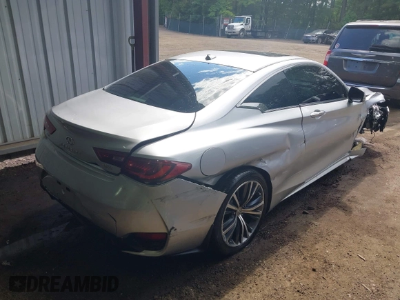 2019 Infiniti Q60 Luxe with VIN JN1EV7EL7KM290268, listed as a IAAI auction lot 42331261 with 95,402 mi miles and . Bid and sale history available at DreamBid. Image 4.