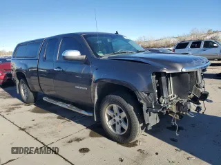 2010 GMC Sierra 1500 with VIN 1GTYKWE25AZ287603, listed as a Copart auction lot 79926284 with 122,683 mi miles and Salvage Title. Bid and sale history available at DreamBid. Image 4.