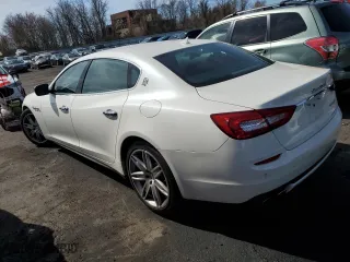 2016 Maserati Quattroporte S with VIN ZAM56RPA8G1170498, listed as a Copart auction lot 48034924 with 104,960 mi miles and Salvage Title. Bid and sale history available at carsss.com. Image 2.
