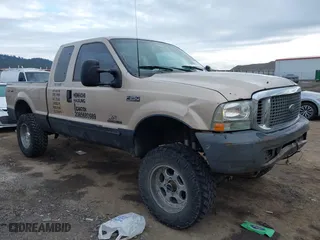 1999 Ford Super Duty F-250 XL with VIN 1FTNX21F1XED40173, listed as a IAAI auction lot 41712778 with 166,586 mi miles. Bid and sale history available at carsss.com. Image 1.