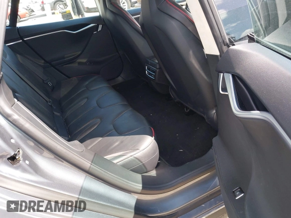 2013 Tesla Model S Performance with VIN 5YJSA1DP8DFP28644, listed as a IAAI auction lot 42641375 with 140,941 mi miles and . Bid and sale history available at DreamBid. Image 8.