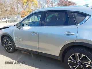 2023 Mazda CX-5 2.5 S Premium Package with VIN JM3KFBDM6P0158294, listed as a IAAI auction lot 40662093 with 15,841 mi miles. Bid and sale history available at carsss.com. Image 14.