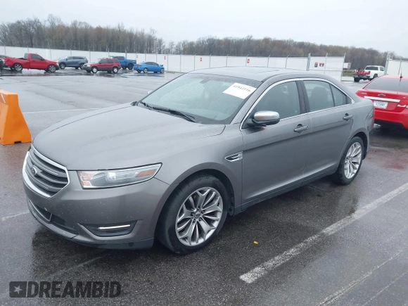 2013 Ford Taurus Limited with VIN 1FAHP2F81DG206437, listed as a IAAI auction lot 41942116 with 194,336 mi miles. Bid and sale history available at carsss.com. Image 2.