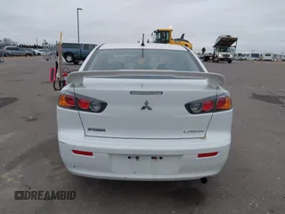 2016 Mitsubishi Lancer SE with VIN JA32V2FWXGU003619, listed as a IAAI auction lot 41041665 with 98,627 mi miles. Bid and sale history available at carsss.com. Image 16.