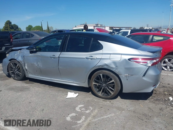 2020 Toyota Camry XSE with VIN 4T1K61AK1LU318098, listed as a IAAI auction lot 41838182 with 64,118 mi miles and . Bid and sale history available at DreamBid. Image 14.