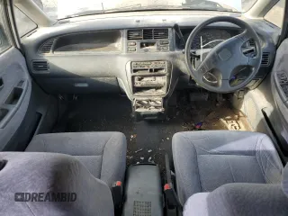 1995 Honda Odyssey with VIN RA21049652, listed as a Copart auction lot 85426404 with 271,632 mi miles and Clean title. Bid and sale history available at DreamBid. Image 8.