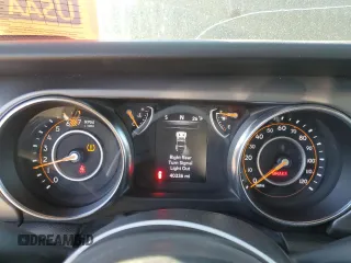 2023 Jeep Wrangler Sport S with VIN 1C4HJXDG7PW533826, listed as a Copart auction lot 86688294 with 40,336 mi miles and Salvage Title. Bid and sale history available at DreamBid. Image 9.