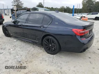 2019 BMW 7 Series M760i xDrive with VIN WBA7H6C51KG615276, listed as a Copart auction lot 79597234 with 39,195 mi miles and Salvage Title. Bid and sale history available at carsss.com. Image 2.