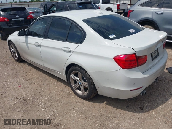 2013 BMW 3 Series 328i with VIN WBA3A5C5XDJ461783, listed as a IAAI auction lot 42150355 with 115,992 mi miles and . Bid and sale history available at DreamBid. Image 3.