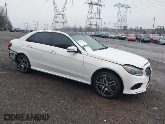 2014 Mercedes-Benz E 550 Sport with VIN WDDHF9BBXEA940995, listed as a IAAI auction lot 41872452 with 50,451 mi miles and . Bid and sale history available at DreamBid. Image 1.