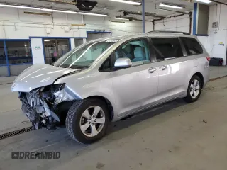 2015 Toyota Sienna LE AAS с VIN 5TDKK3DC1FS571821, выставлен на аукционе Copart как лот 57348545 с пробегом 120 014 миль миль и Списание • Salvage title. История ставок и продаж доступна на DreamBid. Изображение 1.