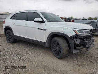 2022 Volkswagen Atlas SE with VIN 1V2KC2CAXNC204602, listed as a Copart auction lot 47306435 with 52,641 mi miles and Salvage title. Bid and sale history available at DreamBid. Image 4.