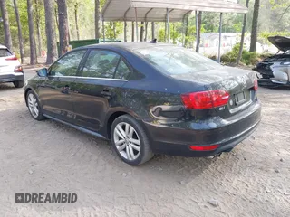 2013 Volkswagen Jetta GLI Autobahn with VIN 3VW467AJ2DM215802, listed as a IAAI auction lot 42077962 with 102,339 mi miles and . Bid and sale history available at DreamBid. Image 3.