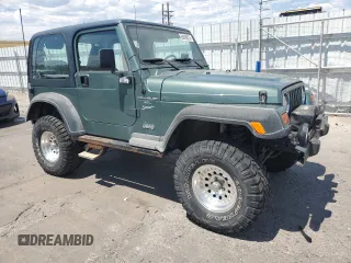 2000 Jeep Wrangler Sport с VIN 1J4FA49S4YP710633, выставлен на аукционе Copart как лот 65095875 с пробегом 107 613 миль миль и Чистый • Clean title. История ставок и продаж доступна на DreamBid. Изображение 4.