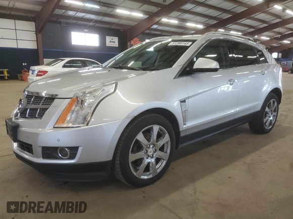 2011 Cadillac SRX Turbo Premium Collection with VIN 3GYFNKE65BS530734, listed as a Copart auction lot 51289145 with 121,879 mi miles and Salvage title. Bid and sale history available at DreamBid. Image 1.