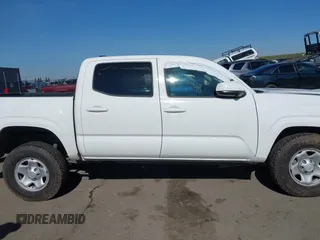 2021 Toyota Tacoma SR z VIN 3TMCZ5AN5MM417384, wystawiony jako IAAI lot #41617168 z przebiegiem 55 969 mil mil oraz . Historia ofert i sprzedaży dostępna na DreamBid. Obrazek 14.