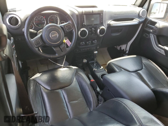 2015 Jeep Wrangler Unlimited Rubicon with VIN 1C4BJWFG6FL508493, listed as a Copart auction lot 54788635 with 127,694 mi miles and Salvage title. Bid and sale history available at DreamBid. Image 8.