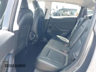 2022 Tesla Model Y Long Range with VIN 7SAYGDEE7NF426404, listed as a IAAI auction lot 42040490 with 39,635 mi miles and . Bid and sale history available at carsss.com. Image 8.