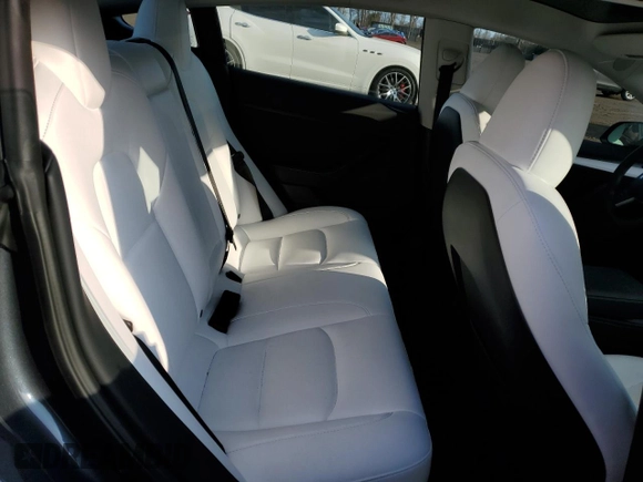 2023 Tesla Model 3 Long Range with VIN 5YJ3E1EBXPF660900, listed as a Copart auction lot 48923265 with 9,954 mi miles and Salvage Title. Bid and sale history available at DreamBid. Image 10.