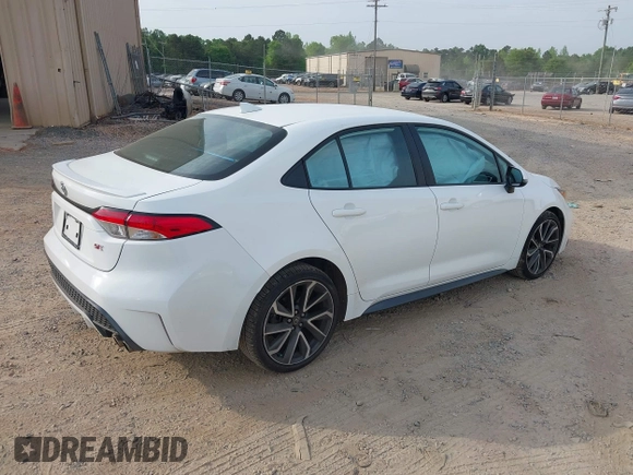 2022 Toyota Corolla SE with VIN 5YFS4MCE0NP136332, listed as a IAAI auction lot 42094001 with 36,371 mi miles and . Bid and sale history available at DreamBid. Image 4.