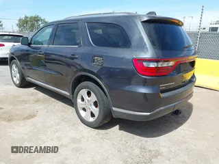 2014 Dodge Durango Limited with VIN 1C4RDJDG7EC586842, listed as a IAAI auction lot 42673969 with 134,094 mi miles and . Bid and sale history available at DreamBid. Image 3.