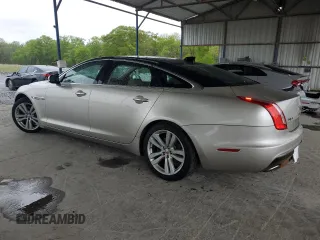2016 Jaguar XJ Portfolio with VIN SAJWA2G70G8V93006, listed as a Copart auction lot 52324635 with 123,690 mi miles and Salvage Title. Bid and sale history available at DreamBid. Image 2.