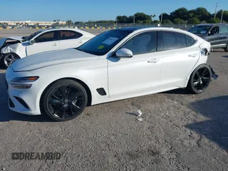 2023 Genesis G70 2.0T z VIN KMTG34TA9PU110258, wystawiony jako IAAI lot #40985797 z przebiegiem 23 422 mil mil oraz . Historia ofert i sprzedaży dostępna na DreamBid. Obrazek 18.