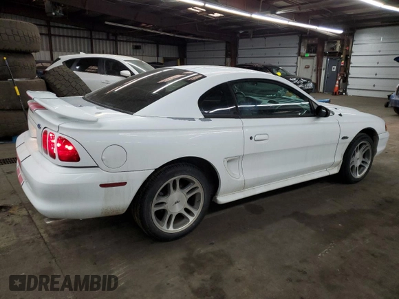 1997 Ford Mustang GT with VIN 1FALP42X3VF140564, listed as a Copart auction lot 44240605 with 120,738 mi miles and Salvage title. Bid and sale history available at DreamBid. Image 3.