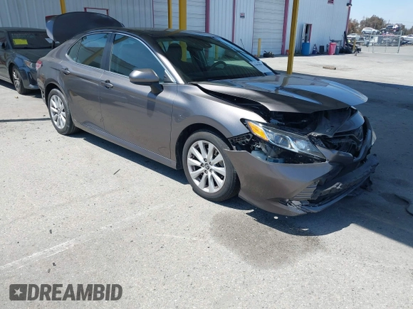 2019 Toyota Camry LE with VIN 4T1B11HK8KU204599, listed as a IAAI auction lot 42096889 with 76,518 mi miles and . Bid and sale history available at DreamBid. Image 1.