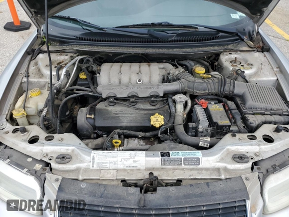 2000 Chrysler Sebring JXi z VIN 3C3EL55H7YT271942, wystawiony jako Copart lot #57423345 z przebiegiem 116 504 mil mil oraz Szkoda całkowita • Salvage title. Historia ofert i sprzedaży dostępna na DreamBid. Obrazek 11.