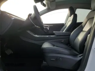 2023 Tesla Model Y Long Range with VIN 7SAYGDEE5PA125887, listed as a Copart auction lot 43188655 with 31,472 mi miles and Salvage Title. Bid and sale history available at DreamBid. Image 7.