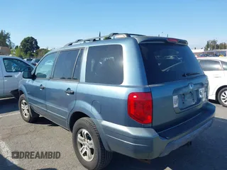 2005 Honda Pilot EX-L with VIN 2HKYF18565H534394, listed as a IAAI auction lot 41539630 with 168,384 mi miles. Bid and sale history available at carsss.com. Image 3.