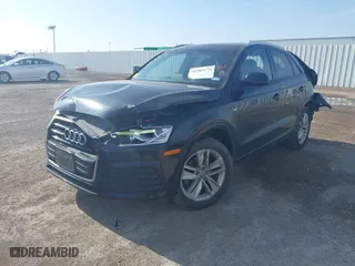 2018 Audi Q3 Premium with VIN WA1BCCFS0JR010450, listed as a IAAI auction lot 41583173 with 100,140 mi miles. Bid and sale history available at carsss.com. Image 2.