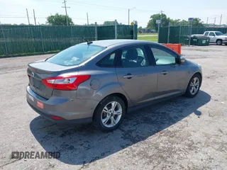2013 Ford Focus SE with VIN 1FADP3F25DL337961, listed as a IAAI auction lot 42410460 with 143,446 mi miles and . Bid and sale history available at DreamBid. Image 4.