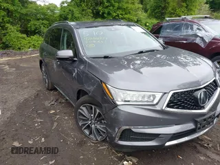 2020 Acura MDX Technology z VIN 5J8YD4H59LL033422, wystawiony jako IAAI lot #42268371 z przebiegiem 42 670 mil mil oraz . Historia ofert i sprzedaży dostępna na DreamBid. Obrazek 6.