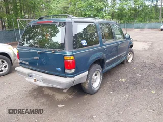 1996 Ford Explorer XL with VIN 1FMDU34XXTZA72897, listed as a IAAI auction lot 42189017 with 169,520 mi miles and . Bid and sale history available at DreamBid. Image 4.