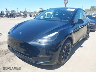 2023 Tesla Model Y Long Range with VIN 7SAYGDEE9PF591096, listed as a IAAI auction lot 41762917 with 22,582 mi miles. Bid and sale history available at carsss.com. Image 2.