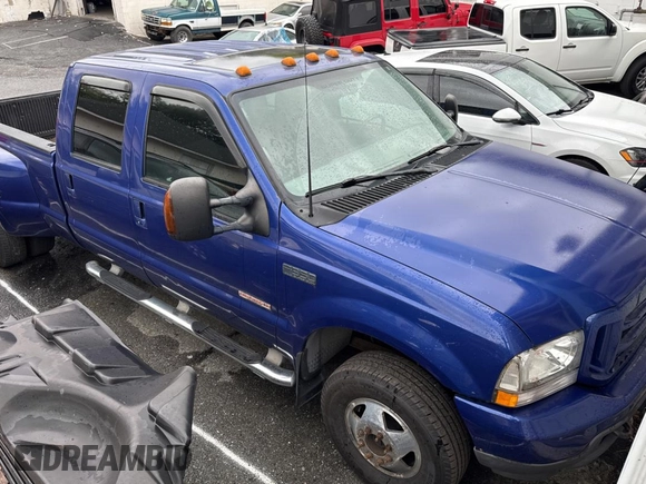 2003 Ford F-350 XL with VIN 1FTWW33P23EC02154, listed as a Copart auction lot 74262214 with 260,336 mi miles and Clean Title. Bid and sale history available at DreamBid. Image 1.