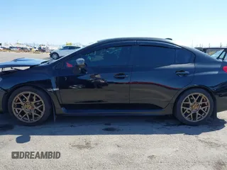 2015 Subaru WRX Limited with VIN JF1VA1G67F8809515, listed as a IAAI auction lot 42003173 with 112,414 mi miles. Bid and sale history available at carsss.com. Image 14.