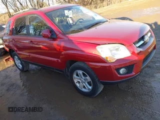 2009 Kia Sportage LX with VIN KNDJE723997634014, listed as a IAAI auction lot 41452224 with 148,643 mi miles. Bid and sale history available at carsss.com. Image 1.