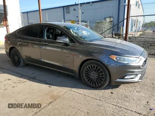 2018 Ford Fusion Titanium с VIN 3FA6P0D92JR192382, выставлен на аукционе Copart как лот 74065774 с пробегом 110 411 миль миль и Списание • Salvage title. История ставок и продаж доступна на DreamBid. Изображение 4.