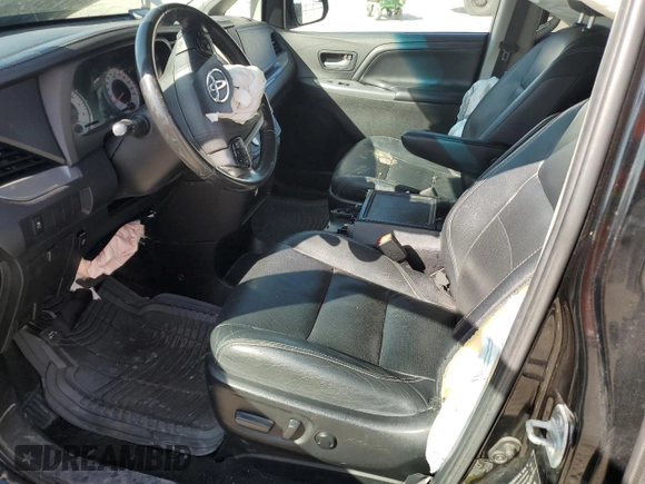 2015 Toyota Sienna SE with VIN 5TDXK3DC1FS655269, listed as a Copart auction lot 53682015 with 100,686 mi miles and Salvage Title. Bid and sale history available at DreamBid. Image 7.