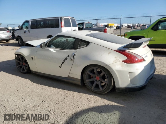 2014 Nissan 370Z Touring with VIN JN1AZ4EH5EM630793, listed as a Copart auction lot 77950484 with 110,229 mi miles and Salvage Title. Bid and sale history available at carsss.com. Image 2.