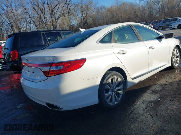 2014 Hyundai Azera with VIN KMHFG4JG6EA354949, listed as a IAAI auction lot 41034372 with 173,338 mi miles and . Bid and sale history available at DreamBid. Image 4.