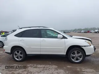 2007 Lexus RX 400h z VIN JTJGW31U572003651, wystawiony jako IAAI lot #42163515 z przebiegiem 358 648 mil mil oraz . Historia ofert i sprzedaży dostępna na DreamBid. Obrazek 13.