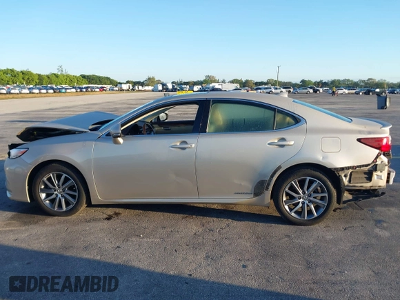 2016 Lexus ES 300h z VIN JTHBW1GG4G2106710, wystawiony jako IAAI lot #41684479 z przebiegiem 144 559 mil mil oraz . Historia ofert i sprzedaży dostępna na DreamBid. Obrazek 15.