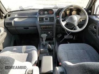 1995 Mitsubishi Montero z VIN V464049505, wystawiony jako Copart lot #83484024 z przebiegiem 158 151 mil mil oraz Szkoda całkowita • Salvage title. Historia ofert i sprzedaży dostępna na DreamBid. Obrazek 8.