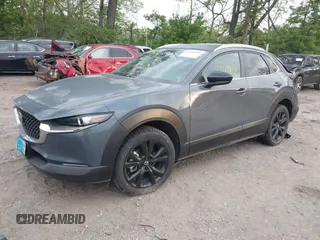 2023 Mazda CX-30 S Carbon Edition with VIN 3MVDMBCM4PM577619, listed as a IAAI auction lot 42219801 with 24,784 mi miles and . Bid and sale history available at DreamBid. Image 17.