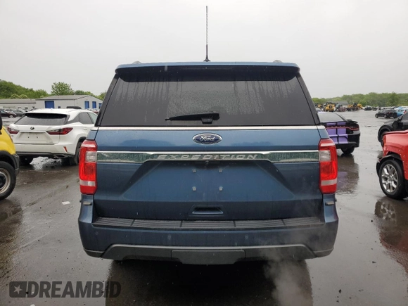 2020 Ford Expedition XL with VIN 1FMJU1GTXLEA78111, listed as a Copart auction lot 58079055 with 76,664 mi miles and Salvage title. Bid and sale history available at DreamBid. Image 6.